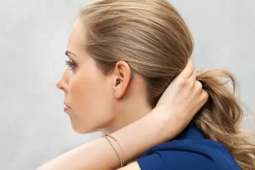 Woman wearing Widex hearing aids